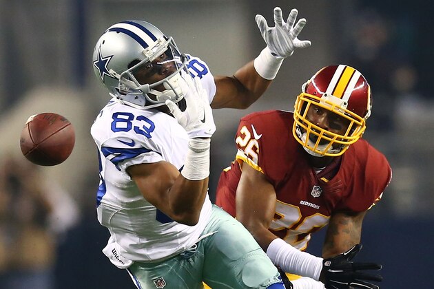 ARLINGTON, TX - OCTOBER 27:  Terrance Williams #83 of the Dallas Cowboys is unable to make the catch as Bashaud Breeland #26 of the Washington Redskins defends during the first half at AT&T Stadium on October 27, 2014 in Arlington, Texas.  (Photo by Ronald Martinez/Getty Images)