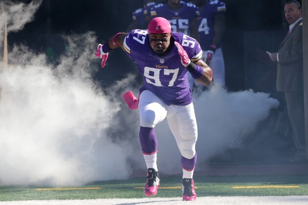 Minnesota Vikings defensive end Everson Griffen is introduced before an NFL football game against the Detroit Lions, Sunday, Oct. 12, 2014, in Minneapolis. (AP Photo/Jim Mone)
