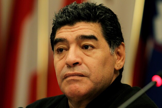 ROME, ITALY - FEBRUARY 14:  Diego Maradona speaks to the media about his ongoing legal dispute with the Italian Tax authorities during a press conference at the European Union office on February 14, 2014 in Rome, Italy. The former footballer is accused of tax evasion and is said to owe almost 40 million Euros in unpaid tax on undeclaired earnings. Maradona denies these claims.  (Photo by Paolo Bruno/Getty Images)