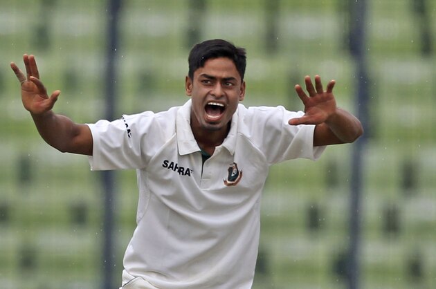 Bangladesh's Taijul Islam successfully makes an LBW appeal for the dismissal of Zimbabwe's Tendai Chatara during the third day of the first cricket test match between them in Dhaka, Bangladesh, Monday, Oct. 27, 2014. (AP Photo/A.M. Ahad)
