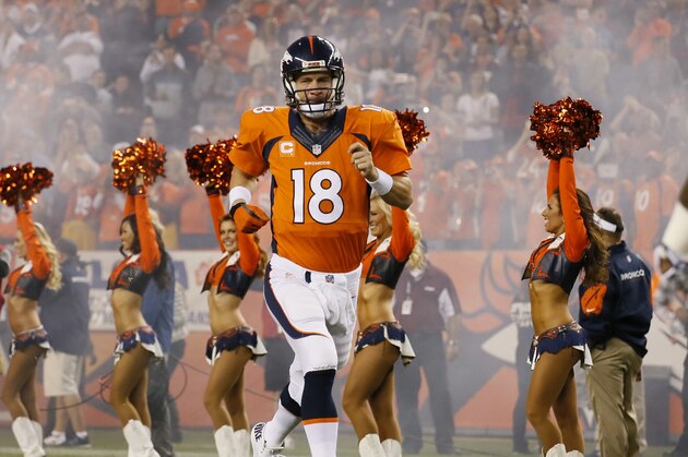 Denver Broncos quarterback Peyton Manning (18) takes the field prior to an NFL football game against the San Diego Chargers, Thursday, Oct. 23, 2014, in Denver. (AP Photo/Jack Dempsey)