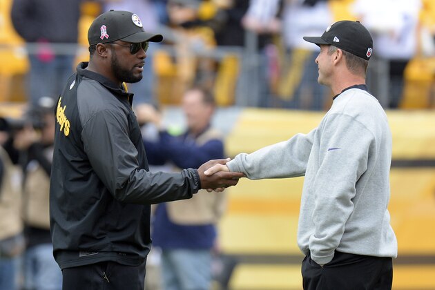 Pittsburgh Steelers head coach Mike Tomlin, left, shakes hands with Baltimore Ravens head coach John Harbaugh before an NFL football game on Sunday, Oct. 20, 2013, in Pittsburgh. (AP Photo/Don Wright)