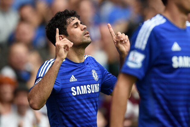 Chelsea’s Diego Costa celebrates scoring his teams second goal during their English Premier League soccer match against Aston Villa at Stamford Bridge, London, Saturday, Sept. 27, 2014. (AP Photo/Tim Ireland)