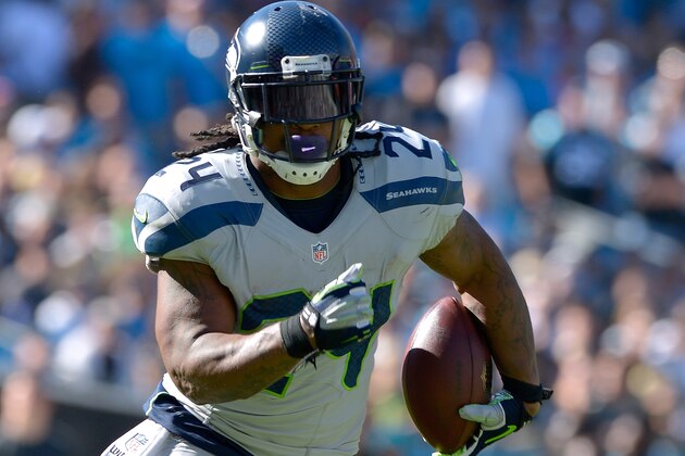 CHARLOTTE, NC - OCTOBER 26:  Marshawn Lynch #24 of the Seattle Seahawks runs against the Carolina Panthers during their game at Bank of America Stadium on October 26, 2014 in Charlotte, North Carolina. The Seahawks won 13-9.  (Photo by Grant Halverson/Getty Images)