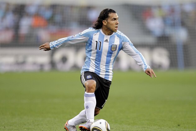 Argentina's Carlos Tevez plays the ball during the World Cup quarterfinal soccer match between Argentina and Germany at the Green Point stadium in Cape Town, South Africa, Saturday, July 3, 2010.  (AP Photo/Matt Dunham)