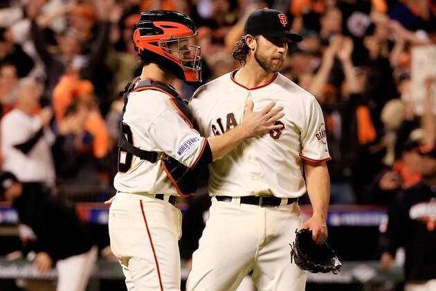 SAN FRANCISCO, CA - OCTOBER 26: Madison Bumgarner #40 celebrates with Buster Posey #28 of the San Francisco Giants after defeating the Kansas City Royals 5-0 in Game Five of the 2014 World Series at AT&T Park on October 26, 2014 in San Francisco, California.  (Photo by Rob Carr/Getty Images)