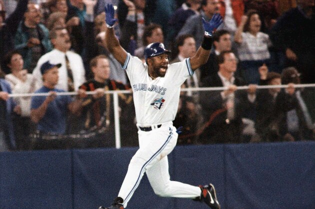 FILE -- Toronto Blue Jays' Joe Carter celebrates his game winning three-run homerun in the ninth inning of game 6 of the World Series in Toronto, in this Oct. 23,1993 photo. Ten years later, Carter has another reason to jump for joy, as he was selected to be inducted into the Canadian Baseball Hall of Fame & Museum this summer. Baseball's career hit leader, Pete Rose, was not selected. (AP Photo/Mark Duncan)