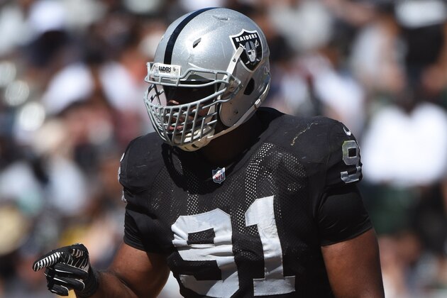 September 14, 2014; Oakland, CA, USA; Oakland Raiders defensive end Justin Tuck (91) during the second quarter against the Houston Texans at O.co Coliseum. The Texans defeated the Raiders 30-14. Mandatory Credit: Kyle Terada-USA TODAY Sports