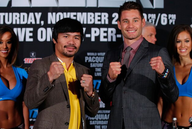 NEW YORK, NY - SEPTEMBER 04:  Manny Pacquiao and Chris Algieri attend the Manny Pacquiao v Chris Algieri Media Tour at The Liberty Theatre on September 4, 2014 in New York City.  (Photo by Joe Scarnici/Getty Images)