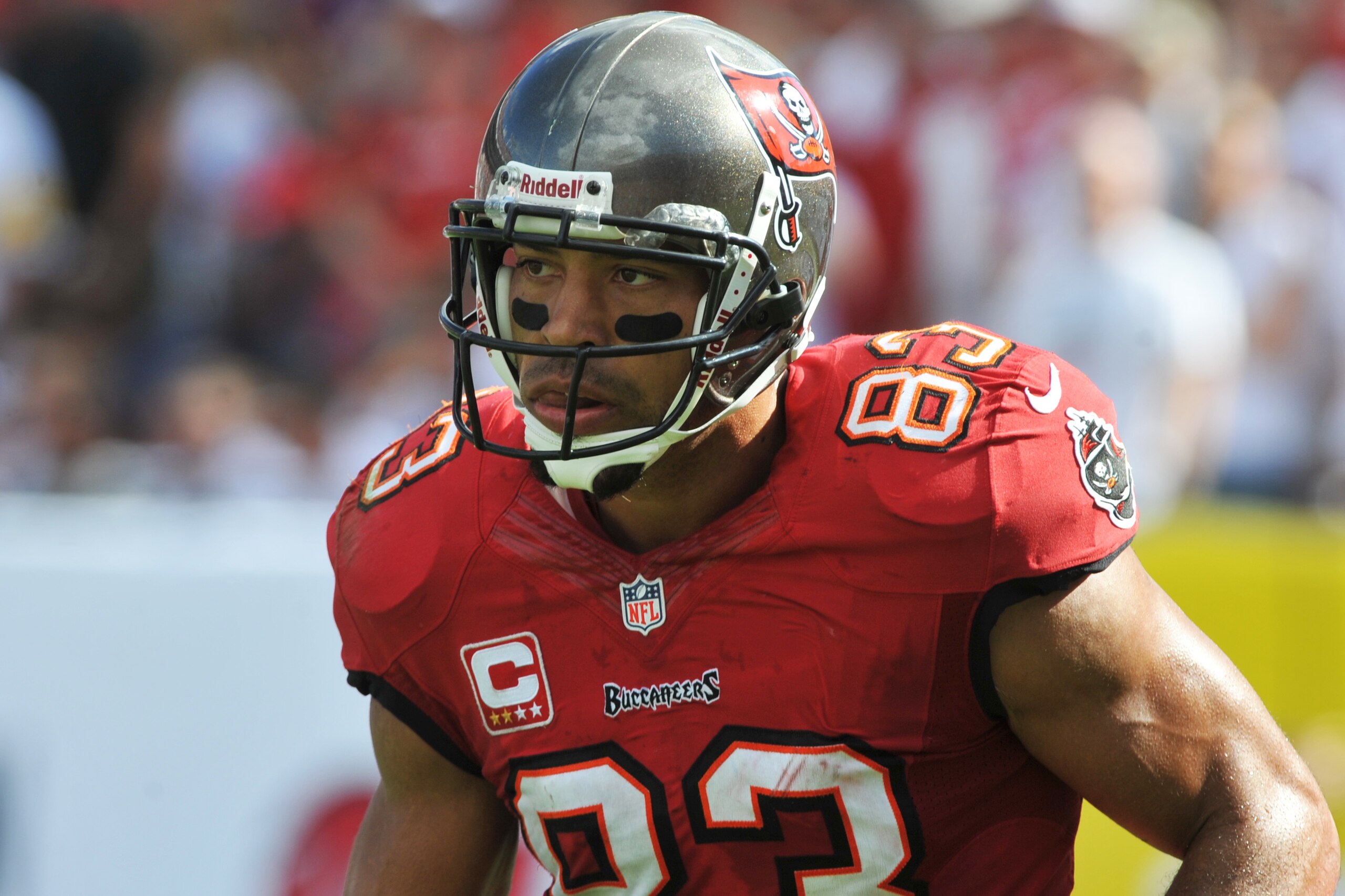 TAMPA, FL -  DECEMBER 8:  Wide receiver Vincent Jackson #83 of the Tampa Bay Buccaneers runs to the bench after an end zone catch against the Buffalo Bills December 8, 2013 at Raymond James Stadium in Tampa, Florida.  The Bucs won 27 - 6. (Photo by Al Messerschmidt/Getty Images)