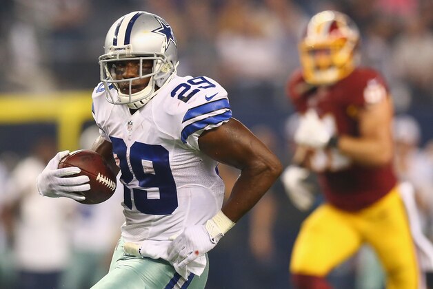 ARLINGTON, TX - OCTOBER 27:  DeMarco Murray #29 of the Dallas Cowboys runs the ball against the Washington Redskins in the second quarter at AT&T Stadium on October 27, 2014 in Arlington, Texas.  (Photo by Ronald Martinez/Getty Images)