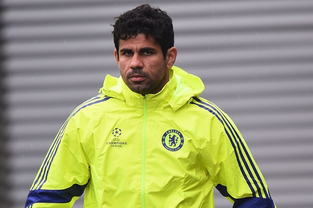 COBHAM, ENGLAND - SEPTEMBER 29:  Diego Costa walks out onto the pitch during the Chelsea Training Session at Chelsea Training Ground on September 29, 2014 in Cobham, England.  (Photo by Christopher Lee/Getty Images)