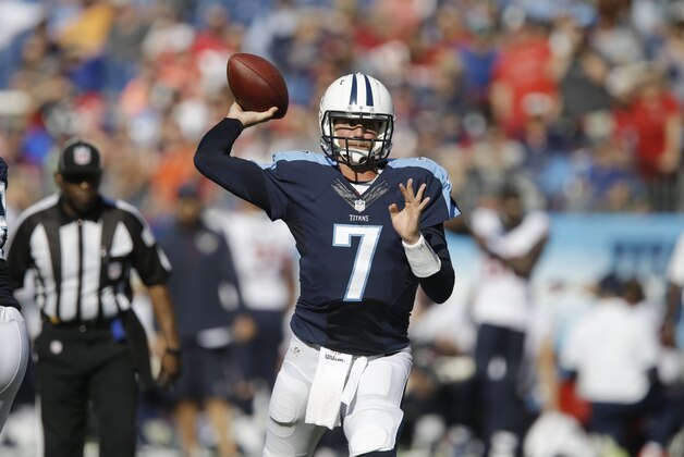 Tennessee Titans quarterback Zach Mettenberger passes against the Houston Texans in the fourth quarter of an NFL football game Sunday, Oct. 26, 2014, in Nashville, Tenn. (AP Photo/Wade Payne)