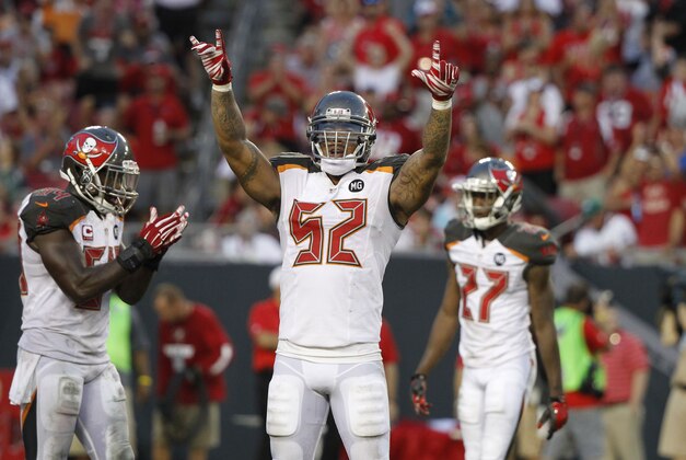 Sep 14, 2014; Tampa, FL, USA; Tampa Bay Buccaneers outside linebacker Jonathan Casillas (52) gets the crowd pumped up during the second half against the Tampa Bay Buccaneers at Raymond James Stadium. St. Louis Rams defeated the Tampa Bay Buccaneers 19-17. Mandatory Credit: Kim Klement-USA TODAY Sports