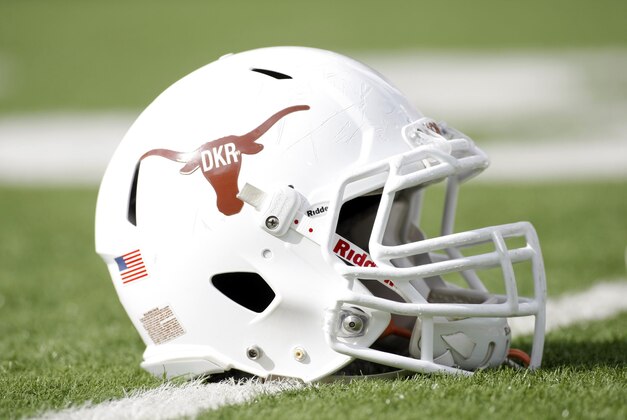 Nov 10, 2012; Austin, TX, USA; Texas Longhorns helmet featuring a DKR logo in honor of former head coach Darrell Royal before a game against the Iowa State Cyclones at Darrell K Royal-Texas Memorial Stadium. Mandatory Credit: Brett Davis-USA TODAY Sports