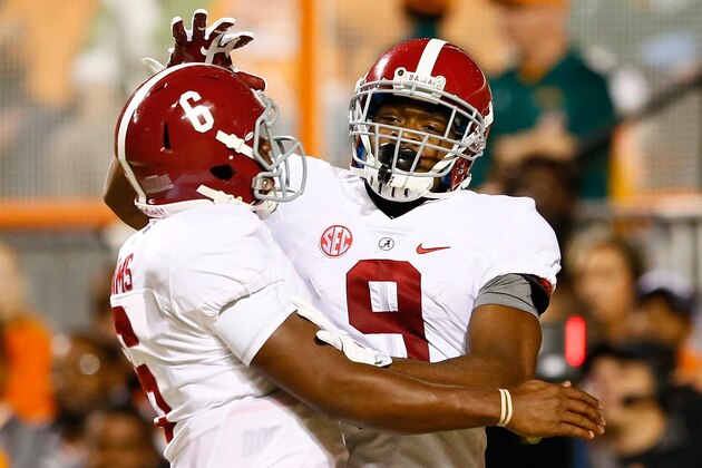 KNOXVILLE, TN - OCTOBER 25:  Amari Cooper #9 of the Alabama Crimson Tide reacts after pulling in a reception for a touchdown from Blake Sims #6 against the Tennessee Volunteers at Neyland Stadium on October 25, 2014 in Knoxville, Tennessee.  (Photo by Kevin C. Cox/Getty Images)
