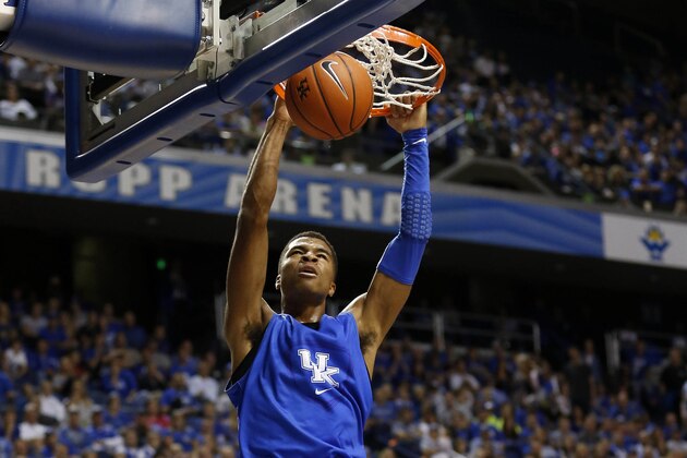 Oct 27, 2014; Lexington, KY, USA; Kentucky Wildcats guard Andrew Harrison (5) dunks the ball during the Blue-White Scrimmage at Rupp Arena. Mandatory Credit: Mark Zerof-USA TODAY Sports