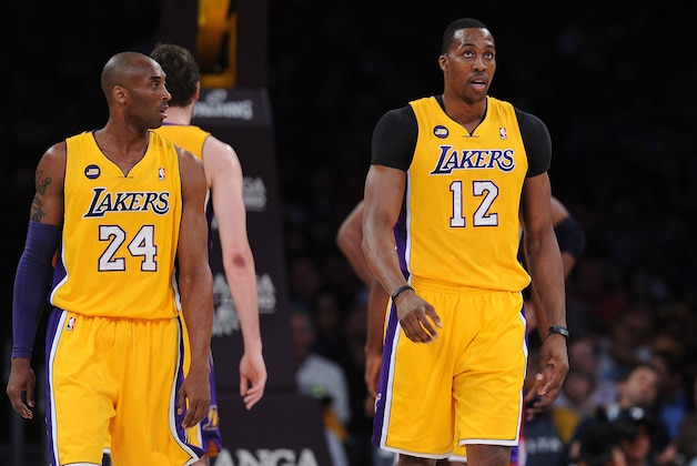 Mar 22, 2013; Los Angeles, CA, USA;  Los Angeles Lakers shooting guard Kobe Bryant (24) and center Dwight Howard (12)  in the first half of the game against the Washington Wizards at the Staples Center. Mandatory Credit: Jayne Kamin-Oncea-USA TODAY Sports