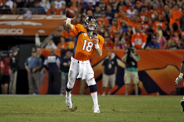 Denver Broncos quarterback Peyton Manning (18) throws against the San Diego Chargers during the second half of an NFL football game, Thursday, Oct. 23, 2014, in Denver. (AP Photo/Jack Dempsey) Denver Broncos quarterback Peyton Manning (18) throws against the San Diego Chargers during the second half of an NFL football game, Thursday, Oct. 23, 2014, in Denver. (AP Photo/Jack Dempsey)
