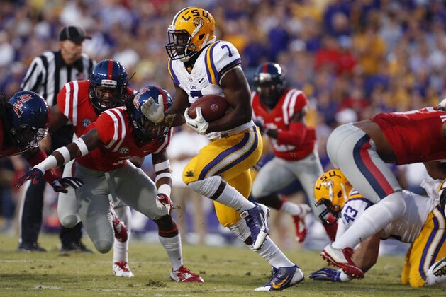 LSU running back Leonard Fournette (7) carries in the first half of an NCAA college football game against Mississippi in Baton Rouge, La., Saturday, Oct. 25, 2014. (AP Photo/Jonathan Bachman) LSU running back Leonard Fournette (7) carries in the first half of an NCAA college football game against Mississippi in Baton Rouge, La., Saturday, Oct. 25, 2014. (AP Photo/Jonathan Bachman)