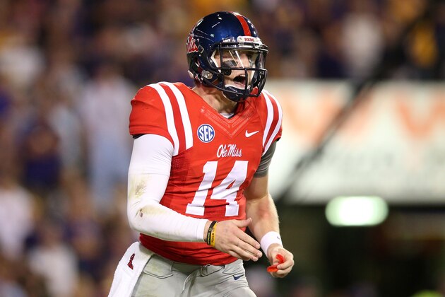 BATON ROUGE, LA - OCTOBER 25:  Quarterback Bo Wallace #14 of the Mississippi Rebels reacts to a throw against the LSU Tigers at Tiger Stadium on October 25, 2014 in Baton Rouge, Louisiana.  (Photo by Chris Graythen/Getty Images)