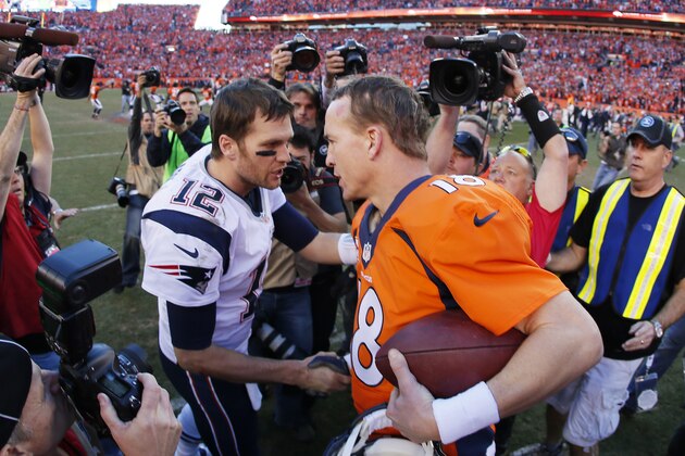 DENVER, CO - JANUARY 19:   Tom Brady #12 of the New England Patriots congratulates  Peyton Manning #18 of the Denver Broncos after the Broncos defeated the Patriots 26 to 16 during the AFC Championship game at Sports Authority Field at Mile High on January 19, 2014 in Denver, Colorado.  (Photo by Kevin C. Cox/Getty Images)