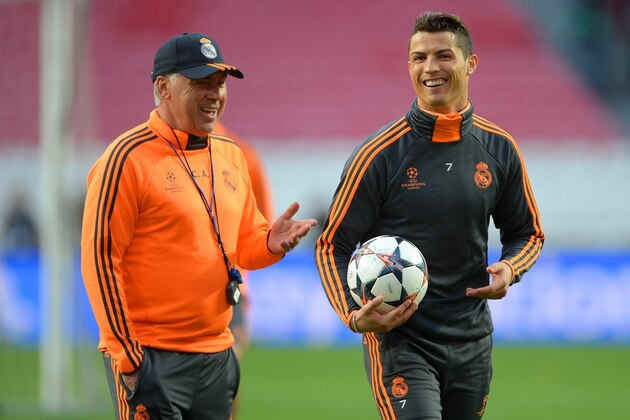 LISBON, PORTUGAL - MAY 23:  Head Coach, Carlo Ancelotti of Real Madrid shares a joke with Cristiano Ronaldo of Real Madrid during a Real Madrid training session ahead of the UEFA Champions League Final against Club Atletico de Madrid at Estadio da Luz on May 23, 2014 in Lisbon, Portugal.  (Photo by Michael Regan/Getty Images)