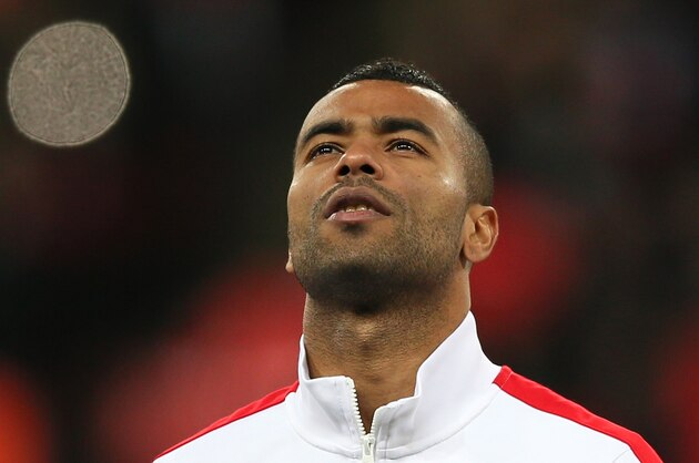 England's Ashley Cole lines up to play against Germany in the international friendly soccer match between England and Germany, at Wembley Stadium in London, Tuesday, Nov. 19, 2013. (AP Photo/Alastair Grant)