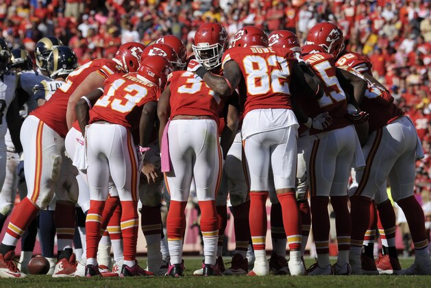 Kansas City Chiefs wide receiver Dwayne Bowe (82) and teammates huddle up before a play against the St. Louis Rams during an NFL football game Sunday, Oct. 26, 2014, in Kansas City, Mo. (AP Photo/Reed Hoffmann)