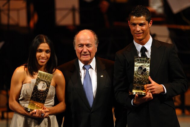 ZURICH, SWITZERLAND - JANUARY 12:  FIFA President Sepp Blatter (C) poses with Marta of Brazil and Cristiano Ronaldo of Portugal after they won The FIFA World Players of the Year 2008, at the Zurich Opera House on January 12, 2009 in Zurich, Switzerland.  (Photo by John Gichigi/Getty Images)