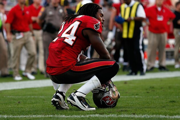 TAMPA, FL - DECEMBER 09:  Safety Mark Barron #24 of the Tampa Bay Buccaneers squats after the Philadelphia Eagles score the winning touchdown as time expired during the game at Raymond James Stadium on December 9, 2012 in Tampa, Florida.  (Photo by J. Meric/Getty Images)