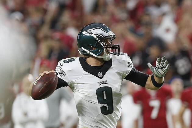 Philadelphia Eagles' Nick Foles throws his final pass of the game against the Arizona Cardinals during the second half of an NFL football game, Sunday, Oct. 26, 2014, in Glendale, Ariz. The Cardinals defeated the Eagles 24-20. (AP Photo/Ross D. Franklin)