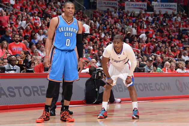LOS ANGELES, CA - MAY 15: Russell Westbrook #0 of the Oklahoma City Thunder looks on against Chris Paul #3 of the Los Angeles Clippers in Game Six of the Western Conference Semifinals during the 2014 NBA Playoffs at Staples Center on May 15, 2014 in Los Angeles, California. NOTE TO USER: User expressly acknowledges and agrees that, by downloading and/or using this Photograph, user is consenting to the terms and conditions of the Getty Images License Agreement. Mandatory Copyright Notice: Copyright 2014 NBAE (Photo by Andrew D. Bernstein/NBAE via Getty Images)