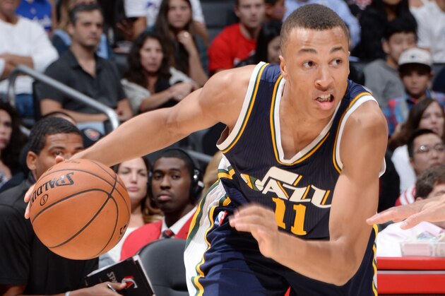 LOS ANGELES, CA - OCTOBER 17: Dante Exum #11 of the Utah Jazz drives to the basket against the Los Angeles Clippers during the game at the STAPLES Center on October 17, 2014 in Los Angeles, California. NOTE TO USER: User expressly acknowledges and agrees that, by downloading and/or using this Photograph, user is consenting to the terms and conditions of the Getty Images License Agreement. Mandatory Copyright Notice: Copyright 2014 NBAE (Photo by Andrew D. Bernstein/NBAE via Getty Images)