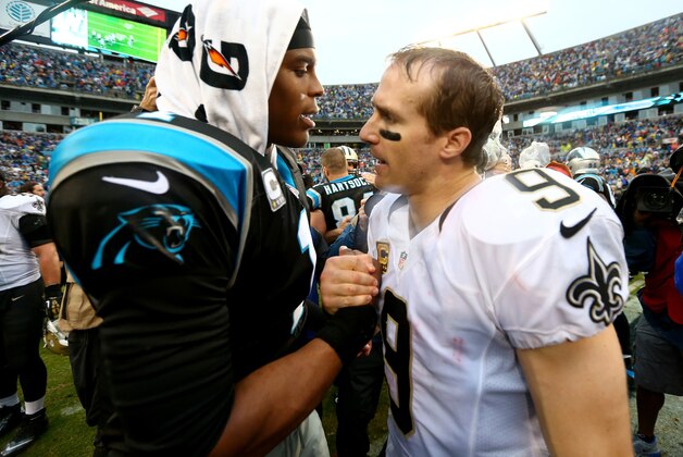 CHARLOTTE, NC - DECEMBER 22:  Cam Newton #1 of the Carolina Panthers and Drew Brees #9 of the New Orleans Saints shake hands after their game at Bank of America Stadium on December 22, 2013 in Charlotte, North Carolina.  (Photo by Streeter Lecka/Getty Images)