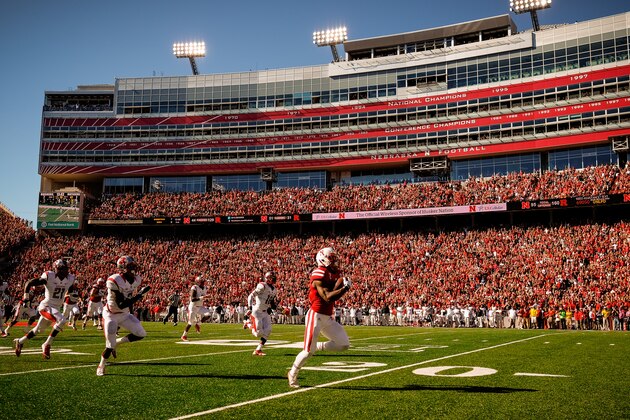 LINCOLN, NE - OCTOBER 25: Running back Ameer Abdullah #8 of the Nebraska Cornhuskers runs for a touchdown during their game against the Rutgers Scarlet Knights at Memorial Stadium on October 25, 2014 in Lincoln, Nebraska. abdullah set a school record for career all-purpose yards. Nebraska defeated Rutgers 42-24. (Photo by Eric Francis/Getty Images)
