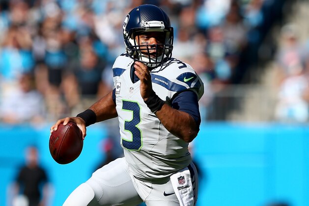 CHARLOTTE, NC - OCTOBER 26:  Russell Wilson #3 of the Seattle Seahawks during the game at Bank of America Stadium on October 26, 2014 in Charlotte, North Carolina.  (Photo by Streeter Lecka/Getty Images)