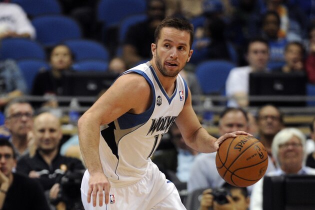 Minnesota Timberwolves guard J.J. Barea (11) dribbles in an NBA basketball game against the San Antonio Spurs at the Target Center on in Minneapolis on Tuesday, April 8, 2014. (AP Photo/Hannah Foslien)