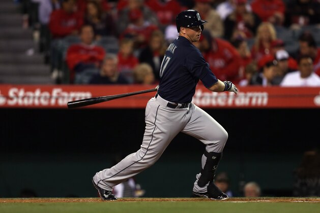 ANAHEIM, CA - APRIL 01:  Justin Smoak #17 of the Seattle Mariners hits a base hit in the second inning against the Los Angeles Angels of Anaheim at Angel Stadium of Anaheim on April 1, 2014 in Anaheim, California.  (Photo by Jeff Gross/Getty Images)
