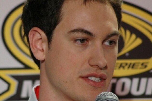 Joey Logano takes media questions in Charlotte before his many 2014 wins.