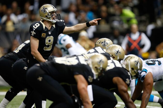NEW ORLEANS, LA - DECEMBER 08:  Drew Brees #9 of the New Orleans Saints reacts during the game against the Carolina Panthers at Mercedes-Benz Superdome on December 8, 2013 in New Orleans, Louisiana.  (Photo by Chris Graythen/Getty Images)