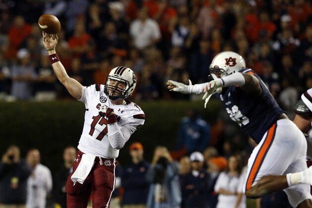 South Carolina quarterback Dylan Thompson (17) throws a pass during the second half of an NCAA college football game against South Carolina on Saturday, Oct. 25, 2014, in Auburn, Ala. (AP Photo/Butch Dill)