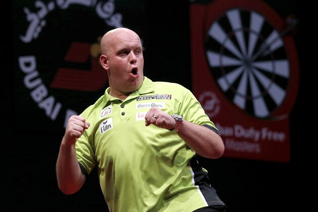 DUBAI, UNITED ARAB EMIRATES - MAY 30:  Michael Van Gerwen of the Netherlands celebrates after winning the 2014 Dubai Duty Free Darts Masters at Dubai Duty Free Tennis Stadium, Irish Village on May 30, 2014 in Dubai, United Arab Emirates. (Photo by Francois Nel/Getty Images)