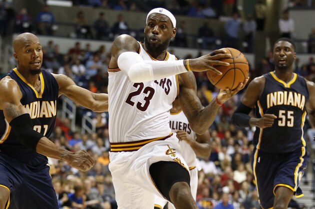CINNCINNATI, OH - OCTOBER 15:  LeBron James #23 of the Cleveland Cavaliers handles the ball against the Indiana Pacers at the Cintas Center at Xavier University on October 15, 2014 in Cincinnati, Ohio. NOTE TO USER: User expressly acknowledges and agrees that, by downloading and/or using this Photograph, user is consenting to the terms and conditions of the Getty Images License Agreement. Mandatory Copyright Notice: Copyright 2014 NBAE (Photo by Gregory Shamus/NBAE via Getty Images)
