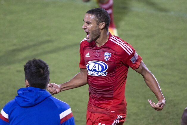 Oct 29, 2014; Dallas, TX, USA; FC Dallas forward Tesho Akindele (13) celebrates scoring a goal in the first half against the Vancouver Whitecaps  at Toyota Stadium. Mandatory Credit: Tim Heitman-USA TODAY Sports