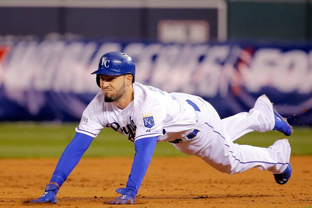 KANSAS CITY, MO - OCTOBER 28:  Eric Hosmer #35 of the Kansas City Royals slides into second base in the second inning against the San Francisco Giants during Game Six of the 2014 World Series at Kauffman Stadium on October 28, 2014 in Kansas City, Missouri.  (Photo by Doug Pensinger/Getty Images)