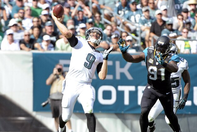 Sep 7, 2014; Philadelphia, PA, USA; Philadelphia Eagles quarterback Nick Foles (9) throws a 68-yard touchdown pass to wide receiver Jeremy Maclin (not pictured) during the fourth quarter against the Jacksonville Jaguars at Lincoln Financial Field. The Eagles defeated the Jaguars, 34-17. Mandatory Credit: Eric Hartline-USA TODAY Sports