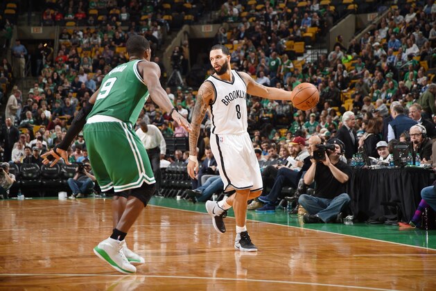 BOSTON, MA - OCTOBER 29: Deron Williams #8 of the Brooklyn Nets looks to pass the ball against Rajon Rondo #9 of the Boston Celtics during the game on October 29, 2014 at the TD Garden in Boston, Massachusetts. NOTE TO USER: User expressly acknowledges and agrees that, by downloading and or using this Photograph, user is consenting to the terms and conditions of the Getty Images License Agreement. Mandatory Copyright Notice: Copyright 2014 NBAE (Photo by Brian Babineau /NBAE via Getty Images)