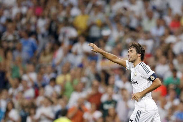 Real Madrid's Raul Gonzalez celebrates after scoring a goal during the Santiago Bernabeu trophy soccer match against Al Sadd at the Santiago Bernabeu stadium,  in Madrid, Spain, Thursday, Aug. 22, 2013. (AP Photo/Daniel Ochoa de Olza)