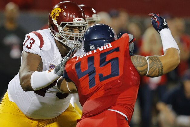 Southern California offensive tackle Zach Banner (73) during the second half of an NCAA college football game against Arizona, Saturday, Oct. 11, 2014, in Tucson, Ariz. (AP Photo/Rick Scuteri)